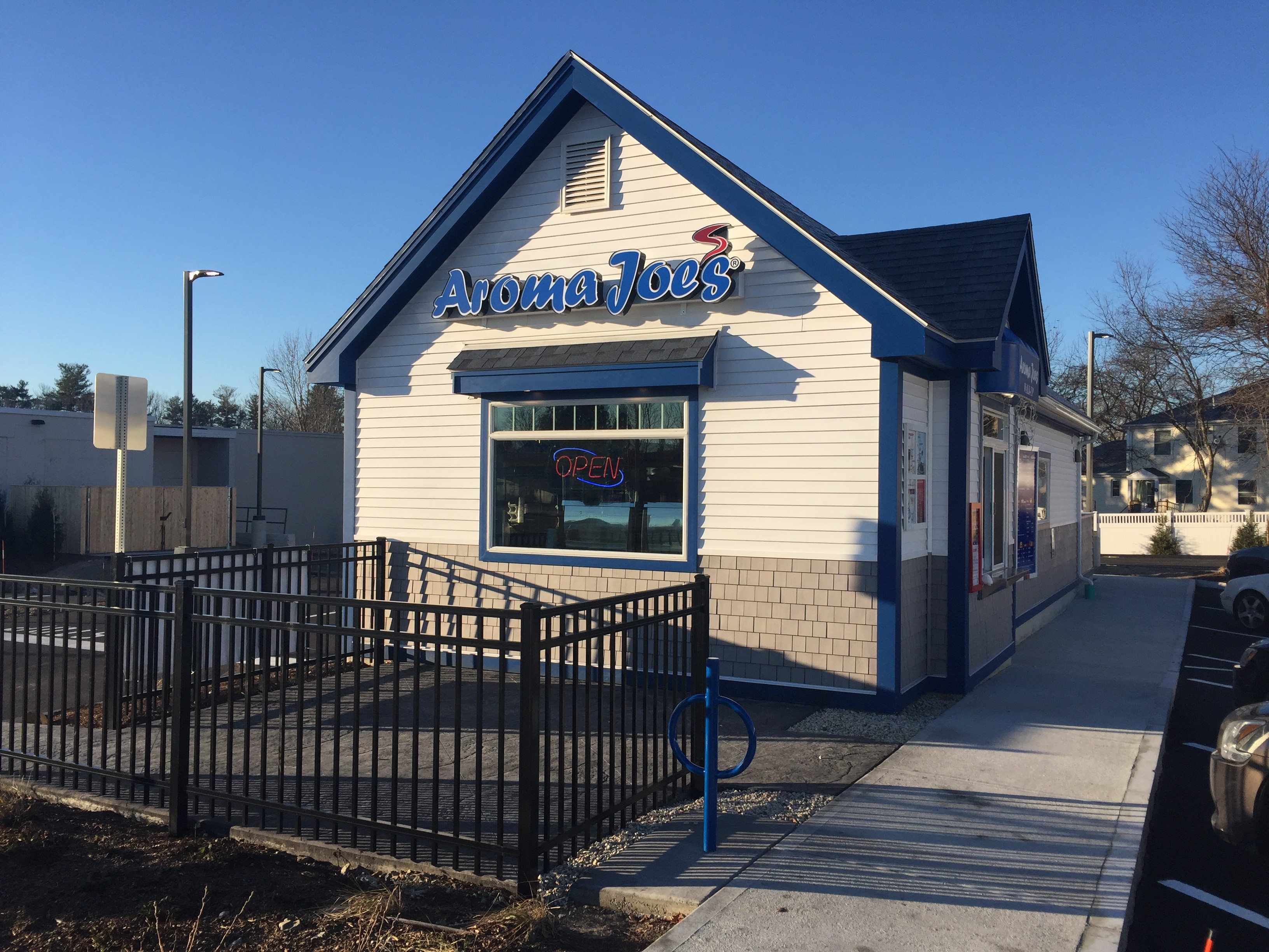 A picture of Aroma Joe's External Building in the sunlight.